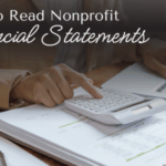 Nonprofit leader reviewing financial statements to gain clarity and confidence.